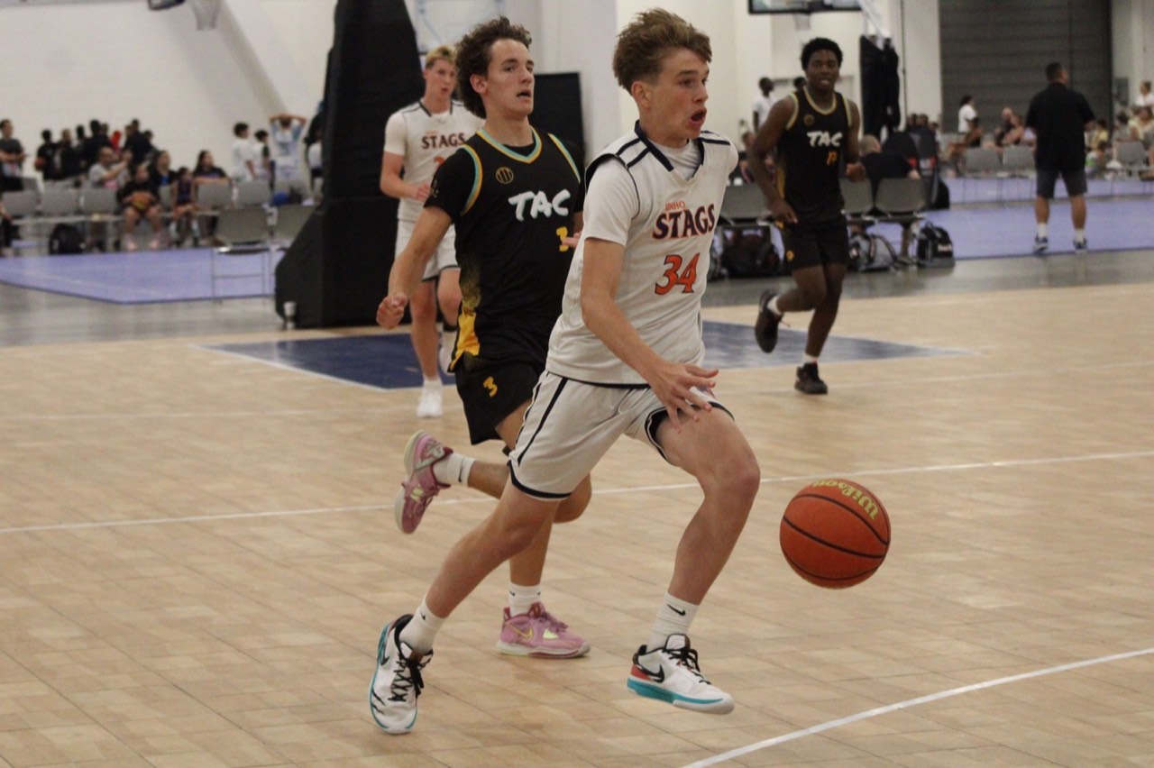Idaho Stags guard drives past a defender in a tournament game