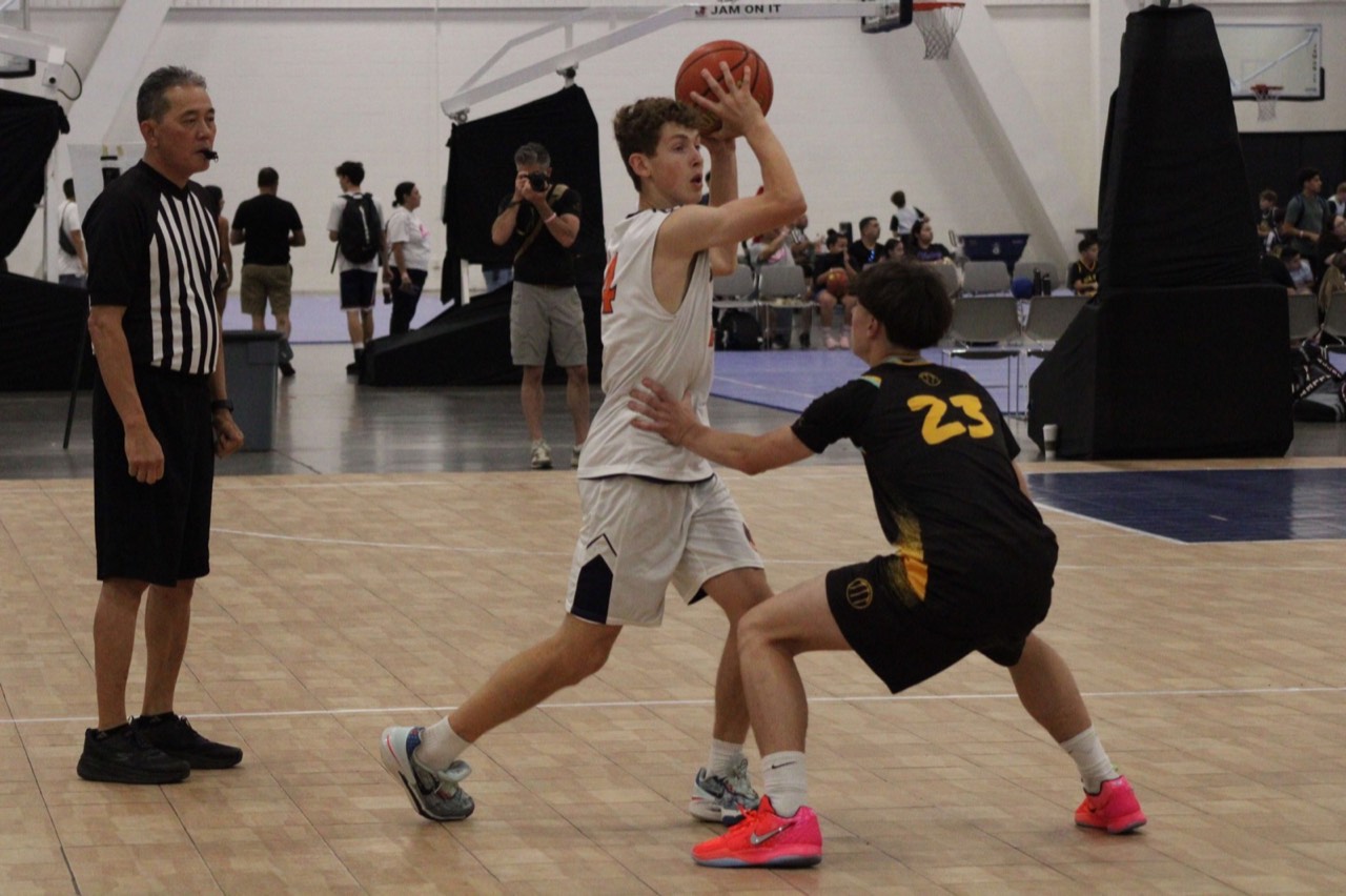 Idaho Stags player looks to make a play while closely guarded